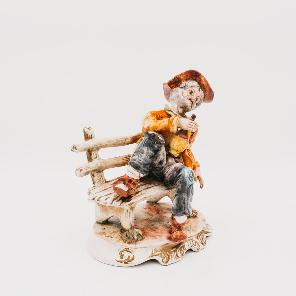 Statuetta Vintage in Porcellana Capodimonte Vecchietto Ubriaco sulla Panchina