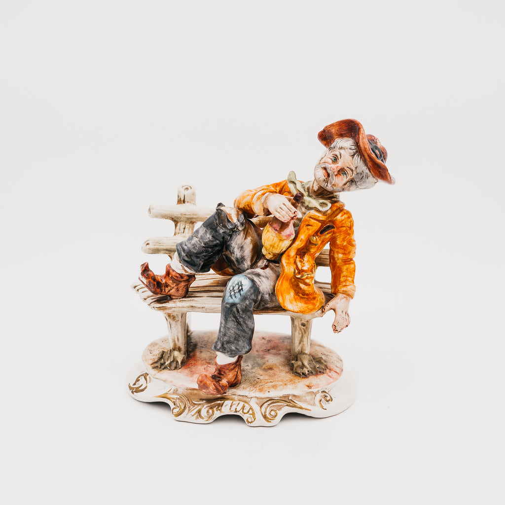 Statuetta Vintage in Porcellana Capodimonte Vecchietto Ubriaco sulla Panchina