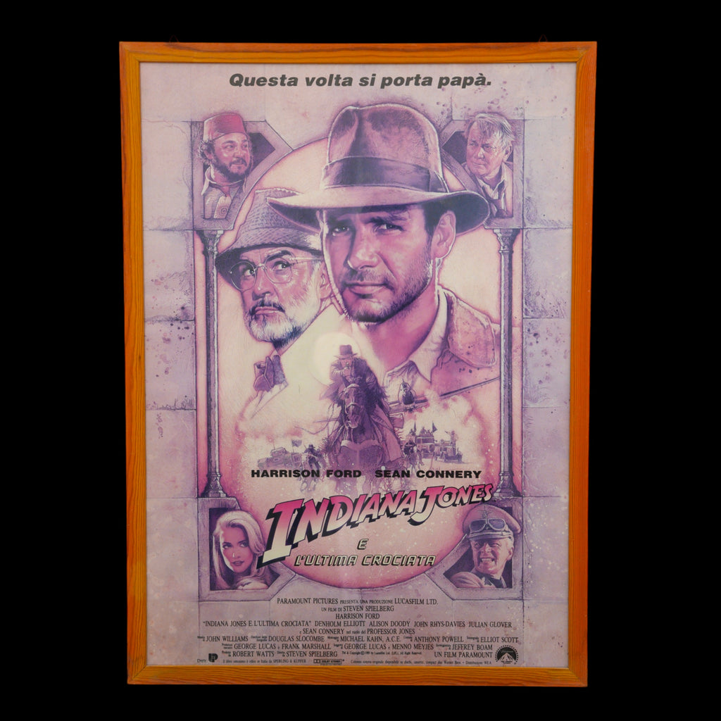 Locandina originale "Indiana Jones e l'Ultima Crociata" (1989) prima stampa italiana – illustrazione di Drew Struzan, cornice in legno – 99 x 72 cm
