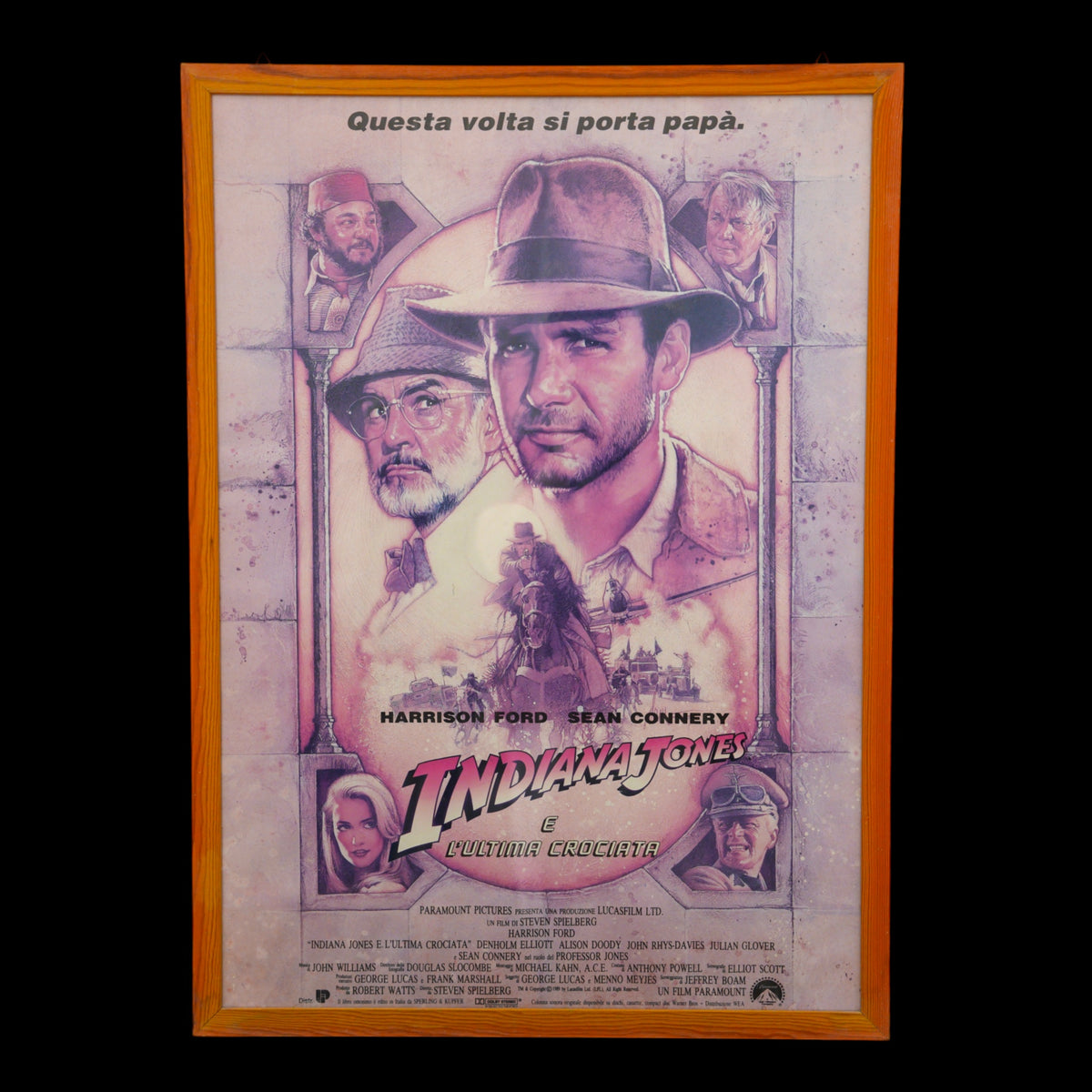 Locandina originale "Indiana Jones e l'Ultima Crociata" (1989) prima stampa italiana – illustrazione di Drew Struzan, cornice in legno – 99 x 72 cm