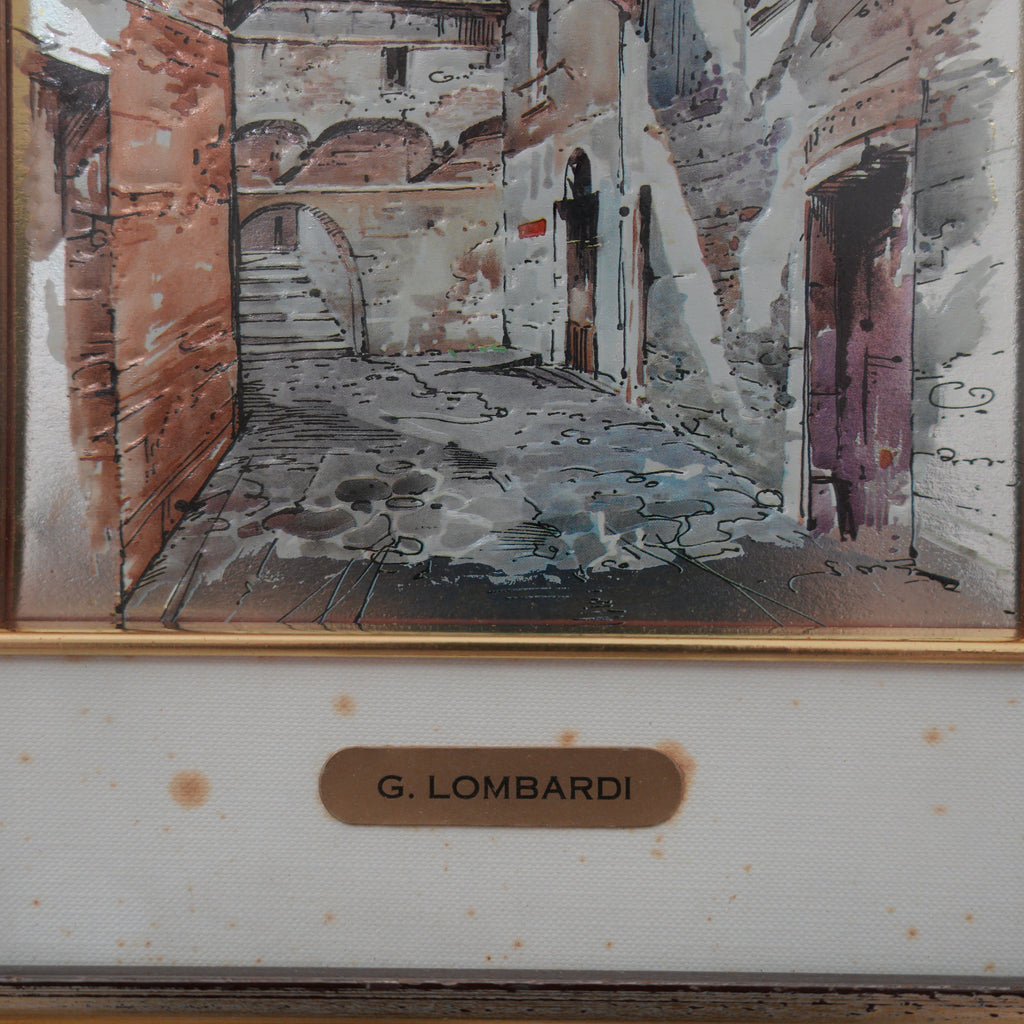 G. Lombardi – Vicolo con Archi e Panni Stesi – Quadro a Rilievo su Lamina Argentata, Doppia Cornice Oro e Argento, 37 x 31 cm