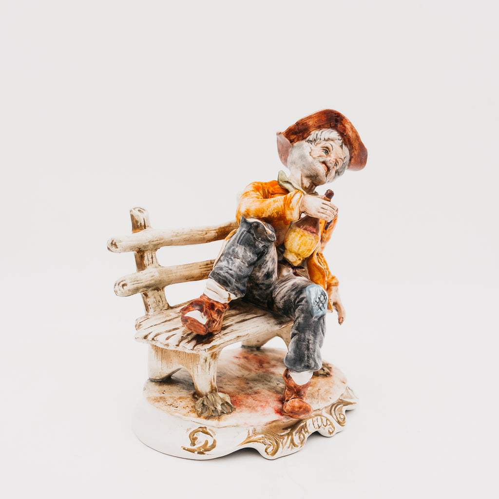 Statuetta Vintage in Porcellana Capodimonte Vecchietto Ubriaco sulla Panchina