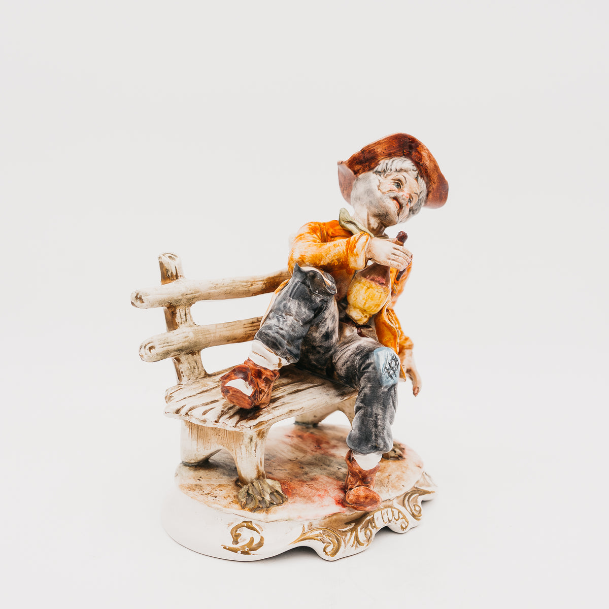 Statuetta Vintage in Porcellana Capodimonte Vecchietto Ubriaco sulla Panchina